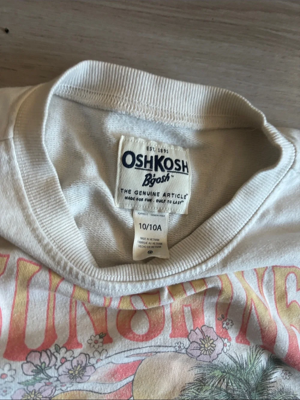 OshKosh B'gosh Cream long sleeve with Pastel Sunshine Graphic